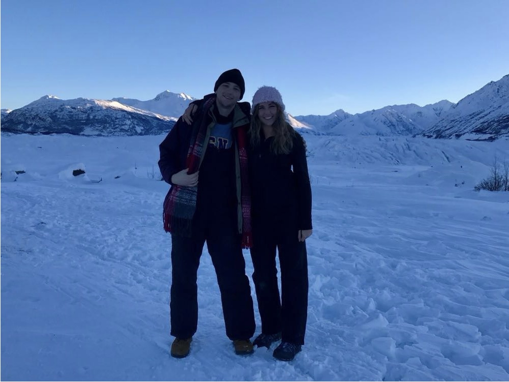 Sam with his sister standing on a glacier in Alaska