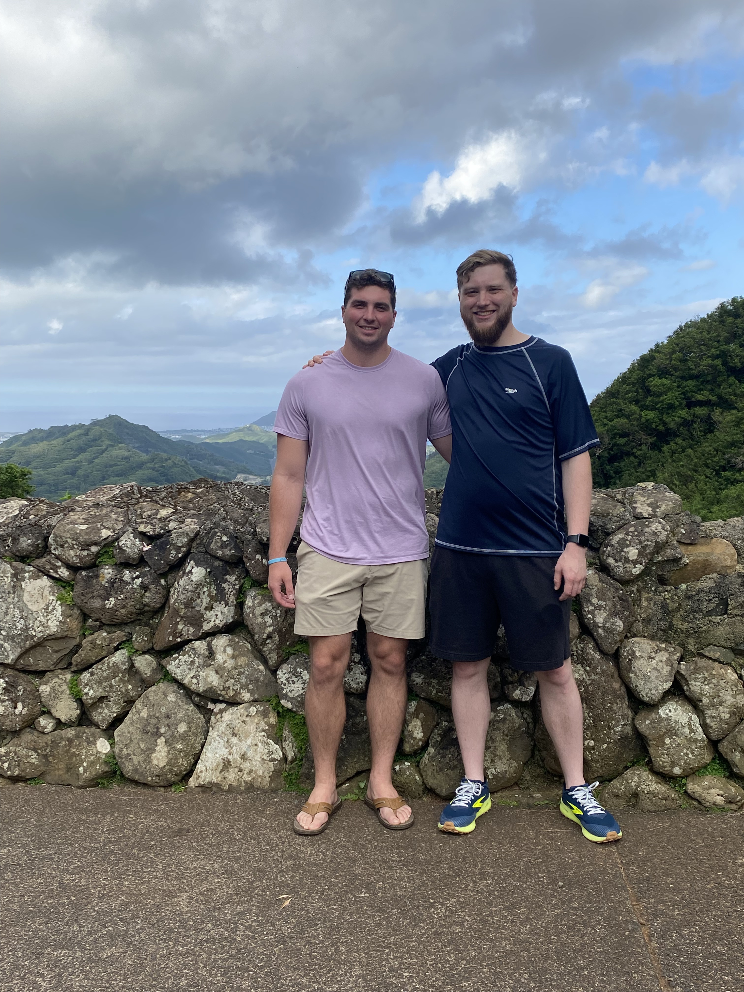 Sam standing with his brother at Pali Lookout